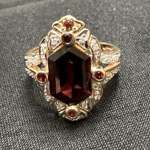Ladies Garnet and Diamond ring.